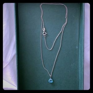 Sterling silver necklace with blue stone